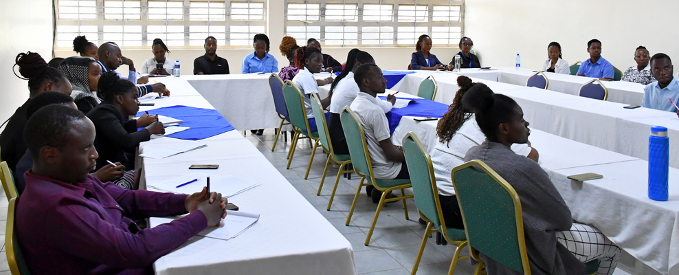 Registrar (AP), Dr. Humphrey Omondi inducting Public Service Commission interns and attachees
